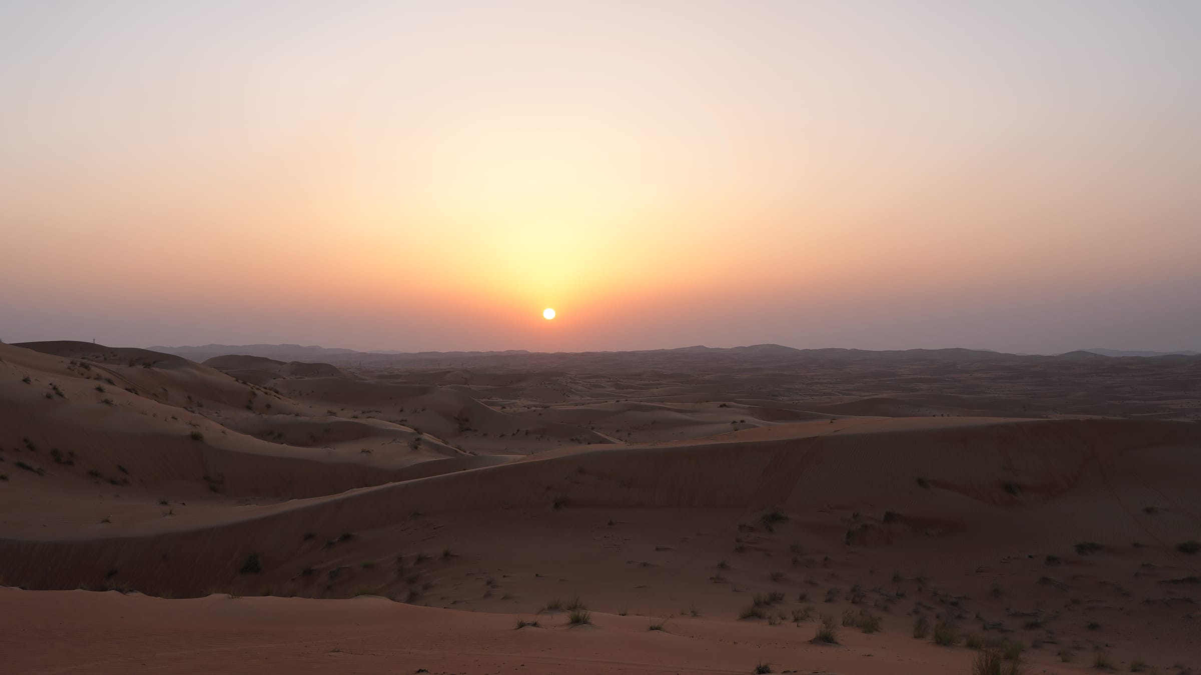 Sunset over the Liwa desert dunes photographed by Ventrax Offroad in the UAE